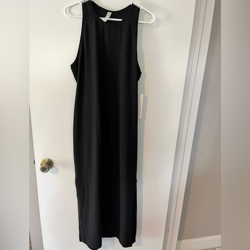 Never worn Get Going Dress from LuLuLemon. Size 12
